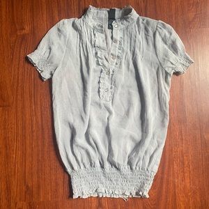 Woman’s gray blouse